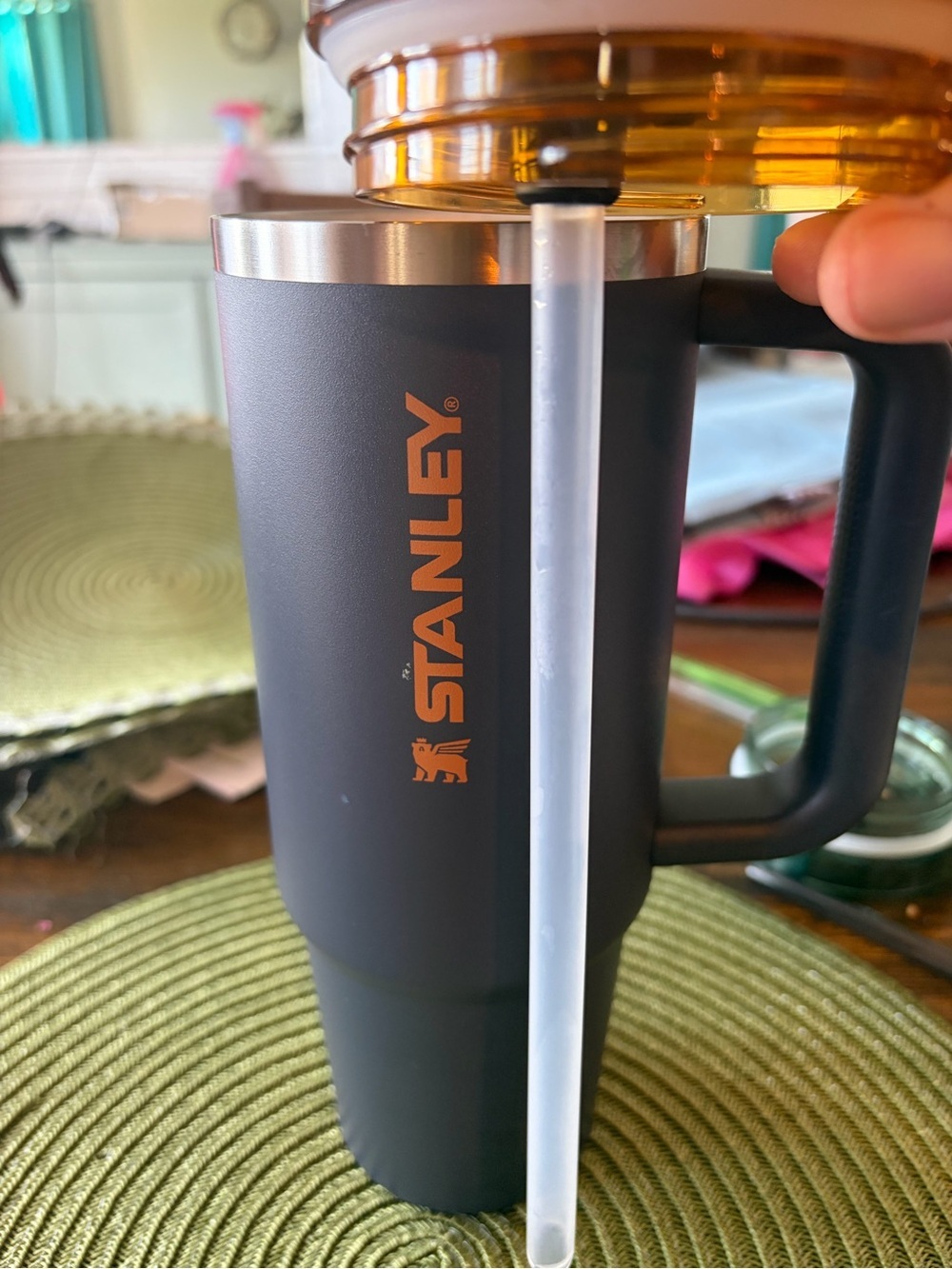 Stanley Matte Black Tumbler with Orange Logo and Clear Straw